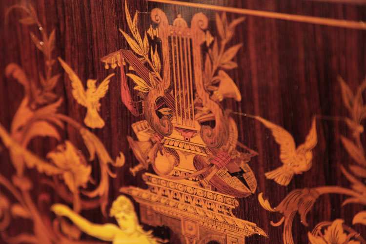 Ascherburg front panel inlay detail of a lyre atop an urn surrounded by birds in flight and scrolling flowers and foliage