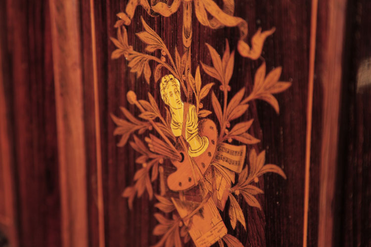 Ascherburg inlaid panel detail of an artist's bust, palette and brushes