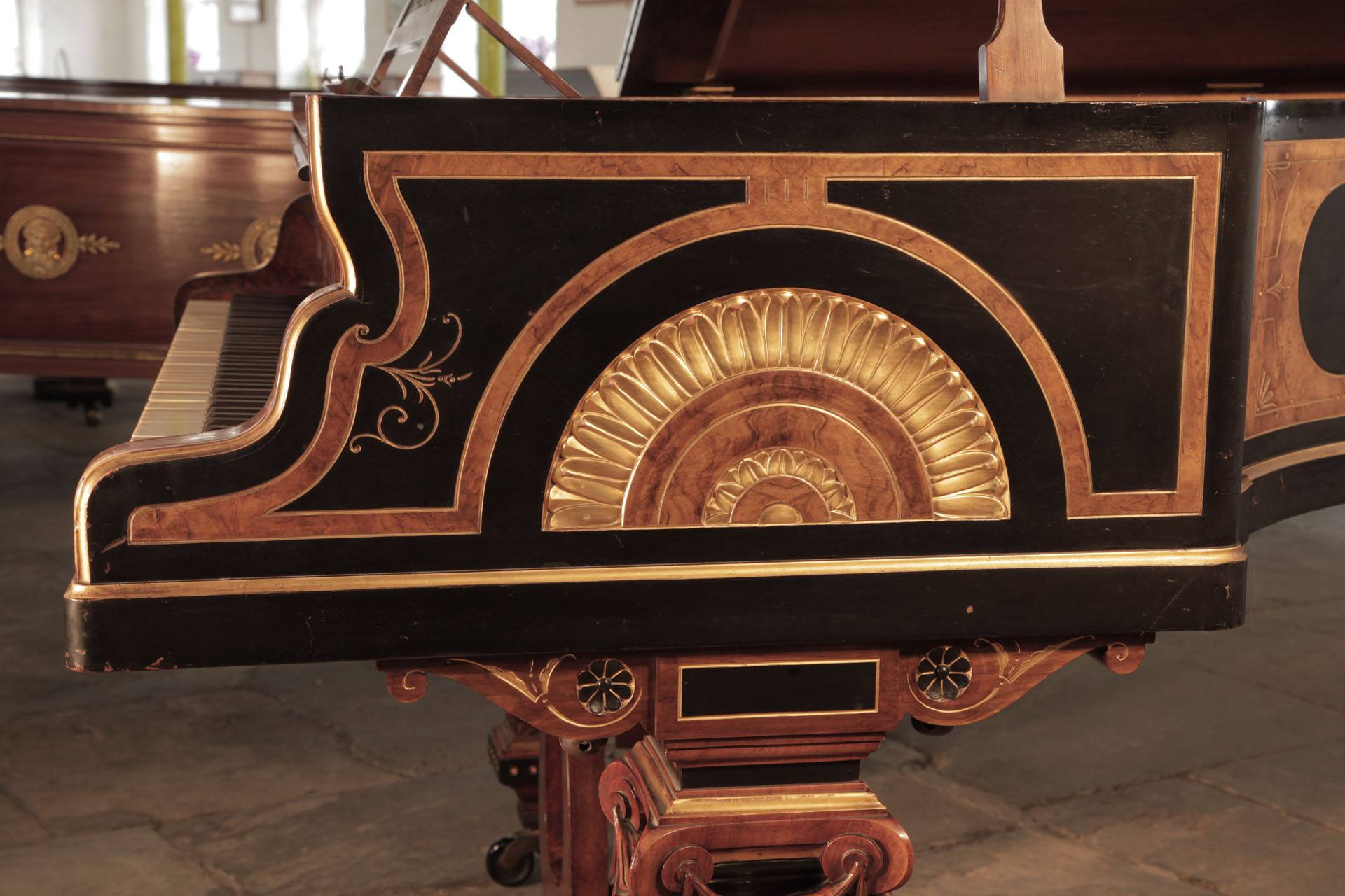 An 1861, Erard grand piano with an ornate burr walnut, black and