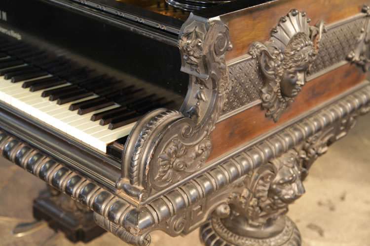 Ornately carved piano cheeks