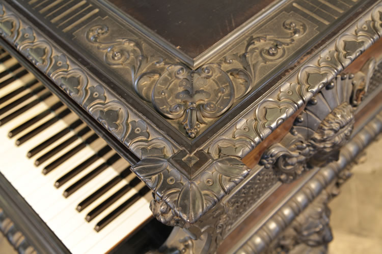 Ornately carved piano lid