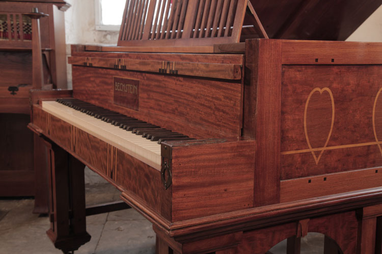 Bechstein square piano cheek with copper openwork mounts inlaid with stylised hearts and stringing