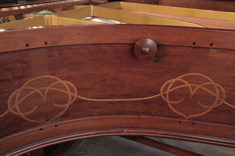 Side cabinet in figured mahogany with stylised stringing inlay in contrasting wood