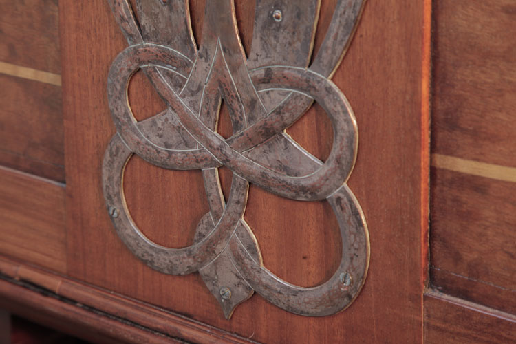 Beaten copper hinge mount in a stylised knot