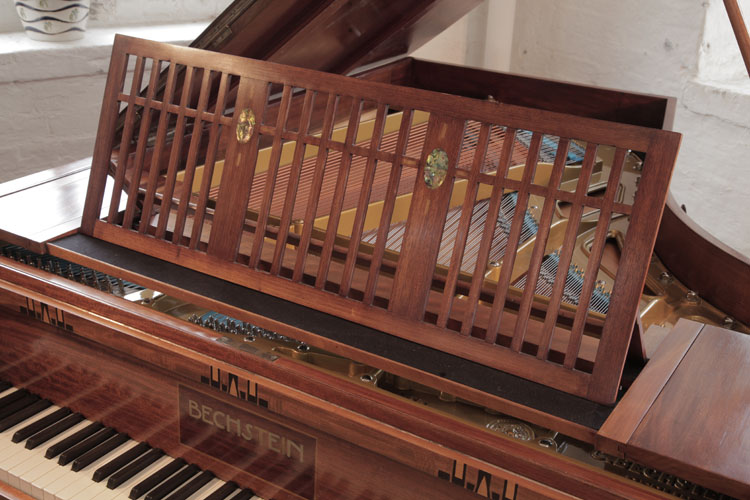 Bechstein openwork music desk in a vertical, slatted design with mother of pearl inlaid oval accents