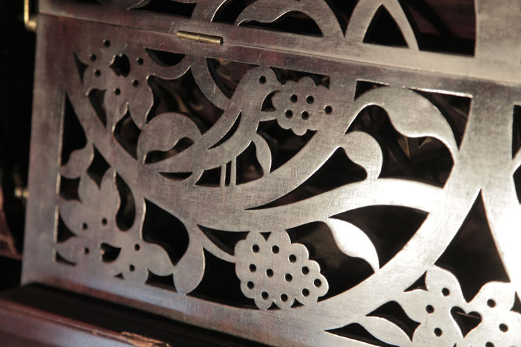 Bechstein stylised birds and foliage on music desk fretwork