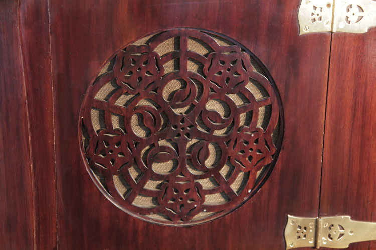 Bechstein circular fretwork front panel in a stylised, floral rosette 