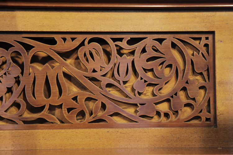 Bechstein fretwork front panel in a stylised, floral cut-out design