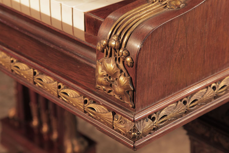 Flowing tendrils leading to stylised foliage