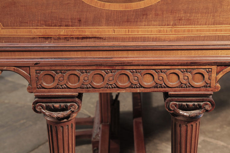 Broadwood leg pediment carved with strapwork in an interlocking circular design 