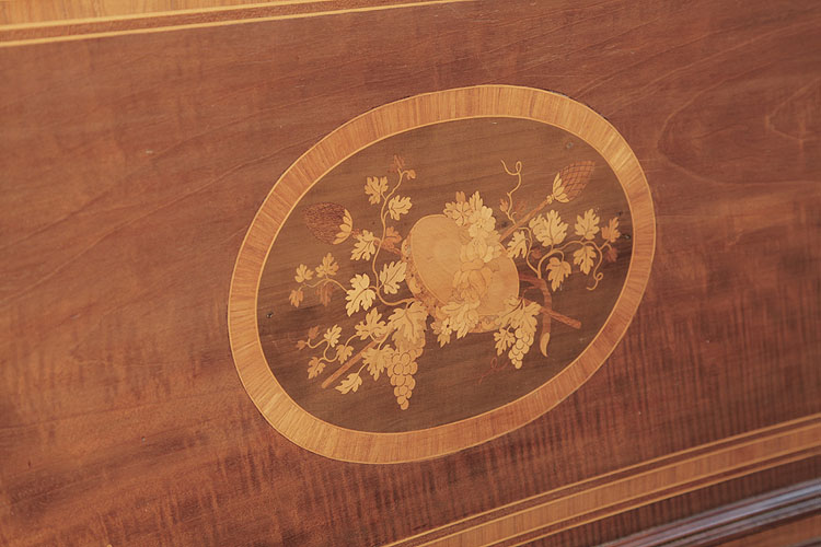 Broadwood inlaid panel featuring a tambourine, flowers and foliage