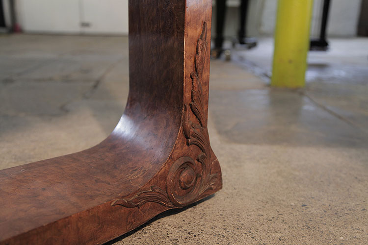 Carved detail on piano leg