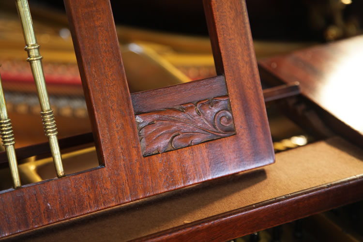 Carved foliage detail on music desk