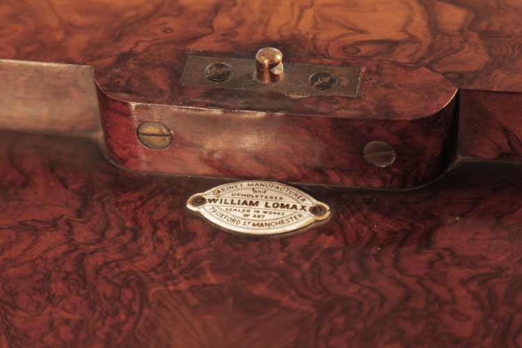 Plaque reading William Lomax, cabinet maker, 79 Oxford Street, Manchester 