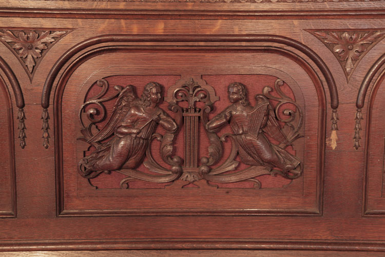 Francke front panel carved with angels with musical instruments and a central lyre 