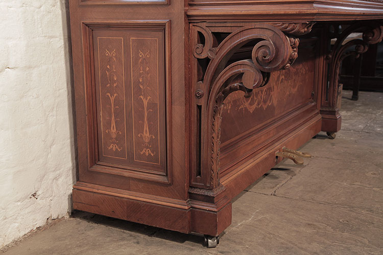 Gast piano leg in a carved, scrolling palmette design