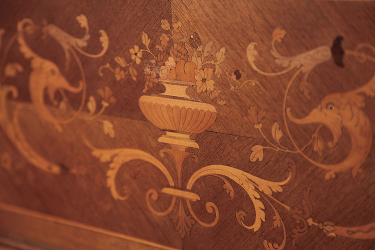 Gast inlay featuring an urn, foliage and flowers