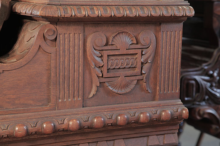 Georg Fortner side panel featuring a stylised winged shield adorned with shells