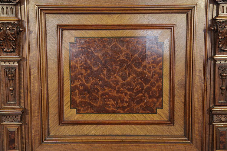German piano front panel detail featuring a variety of walnut inlay