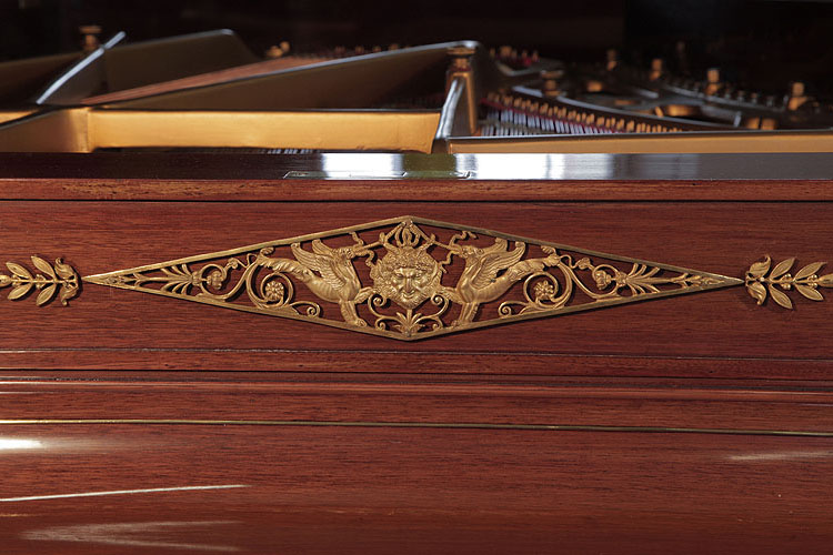 Ibach front panel ormolu mount featuring Pan's head and griffins 