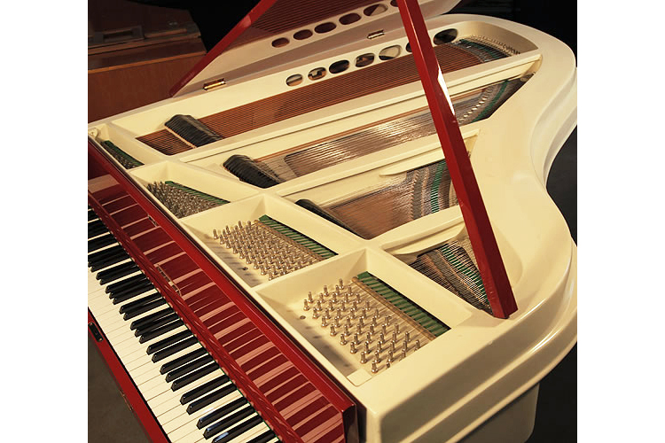 Rippen instrument and floating soundboard, not glued to the body of the piano in the bass end to promote for a more resonant tone