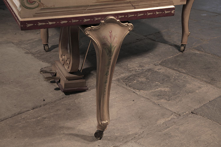 Cabriole piano leg with a scallop top and gilt detail