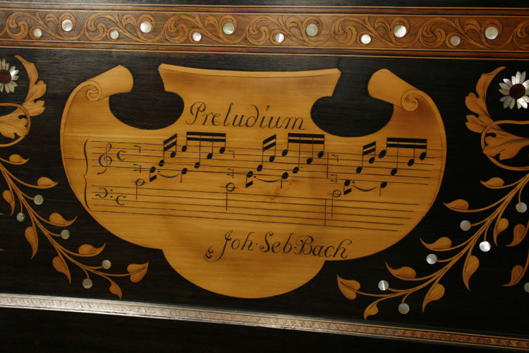 Pelta shields inlaid with part-scores