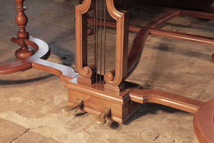 Schiedmayer traditionally shaped, two-pedal piano lyre  attached to the cross stretcher with volute decoration 
