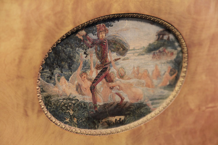 Hand-painted oval by Danish artist Gudmund Hentze featuring a man fleeing beneath the light of the moon with a golden cup as a river of nymphs grasp his legs to slow his escape