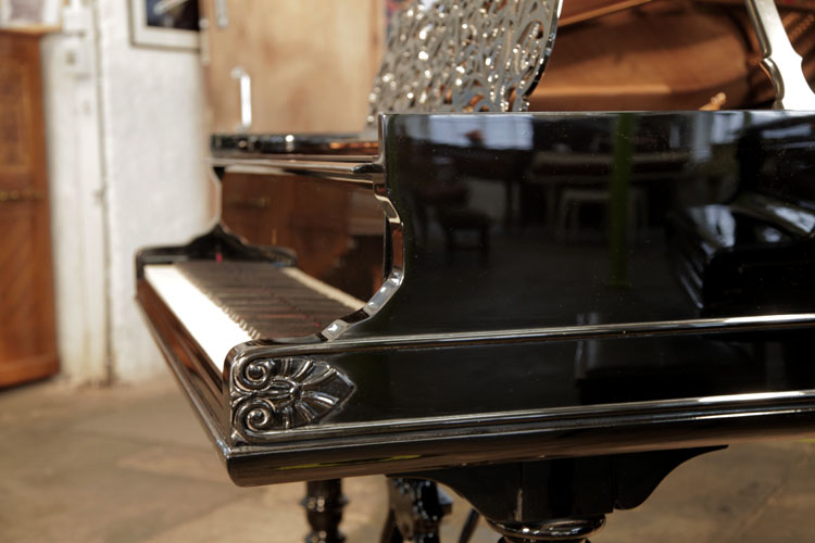 Steinway Model A sinusous piano cheek with carved palmette detail and dual linear case moulding