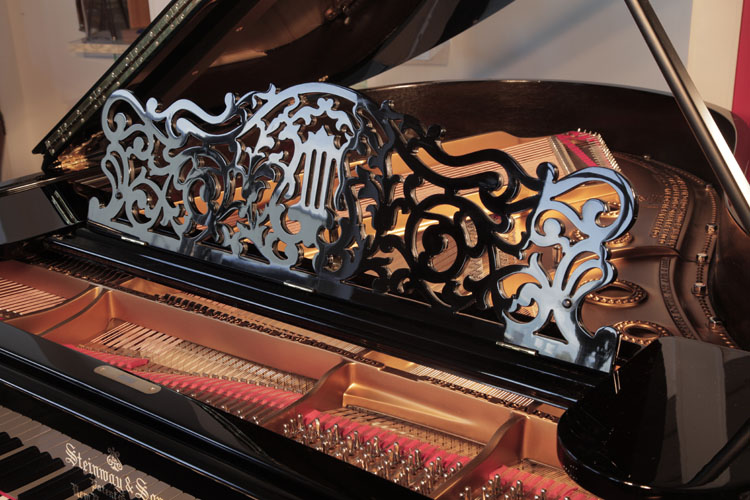 Steinway filigree  piano music desk in an arabesque design with central lyre motif