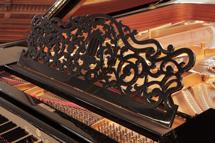 Steinway Model B openwork arabesque piano music desk with central lyre motif