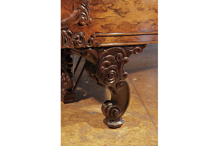 Steinway Model D reverse scroll piano leg carved with foliage in high relief and hidden casters