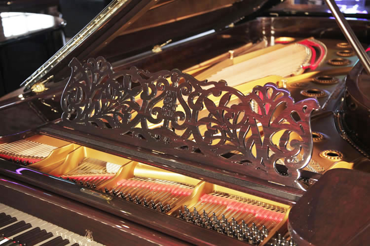 Steinway Model D filigree music desk with a stylised arabesque design and central lyre motif