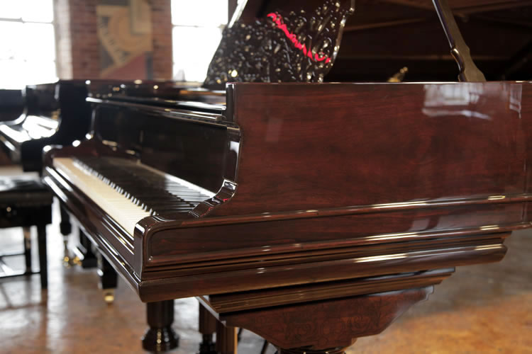 Steinway Model D piano cheek   with sinuous antique styling and double moulding detail