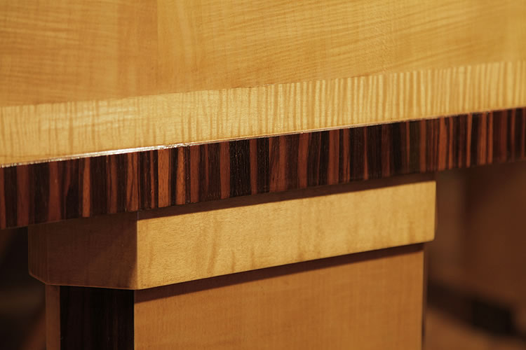 Detail of cabinet inlay in contrasting woods