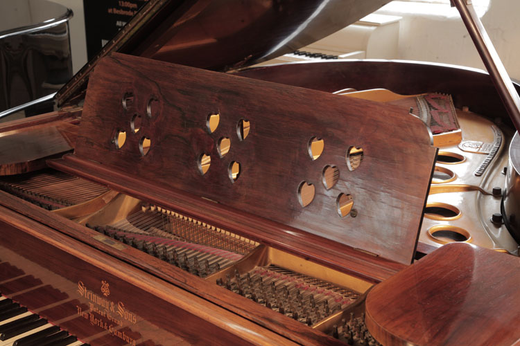 Bespoke Steinway  piano music desk featuring cut out hearts