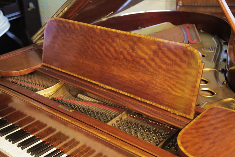 Steinway  piano music desk edged with crossbanding and stringing inlay