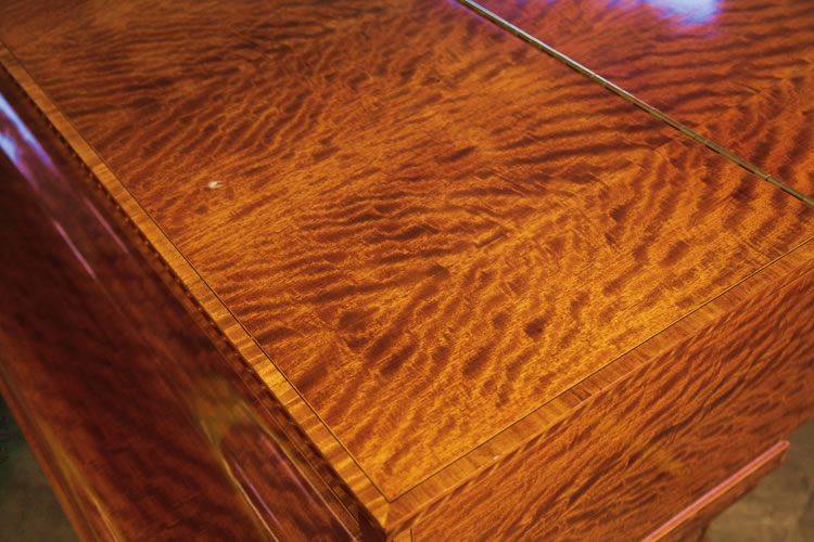 Stunning satinwood wood grain on piano cabinet