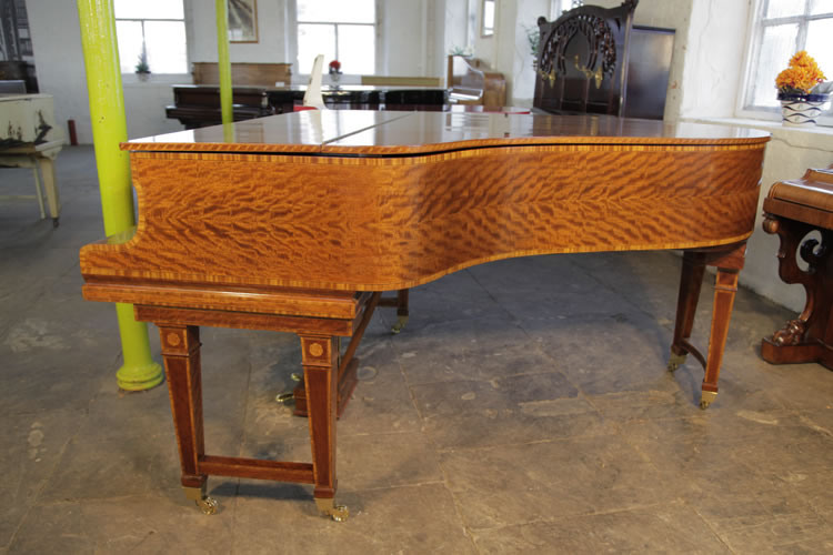 Stunning satinwood wood grain on piano cabinet