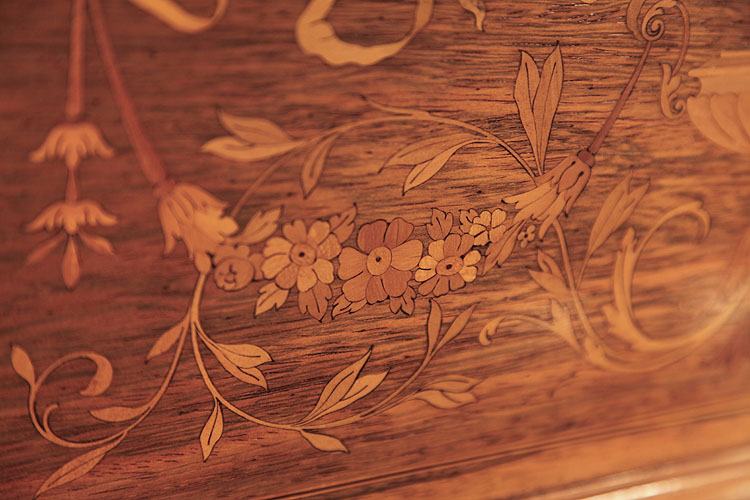 Detail of inlay featuring a floral festoon and scrolling rinceau
