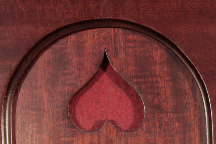 Steinway cut-out inverted heart detail 
