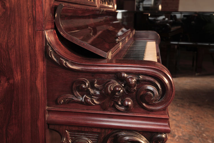 Steinway carved, scrolling piano cheek with a carved hibiscus flower