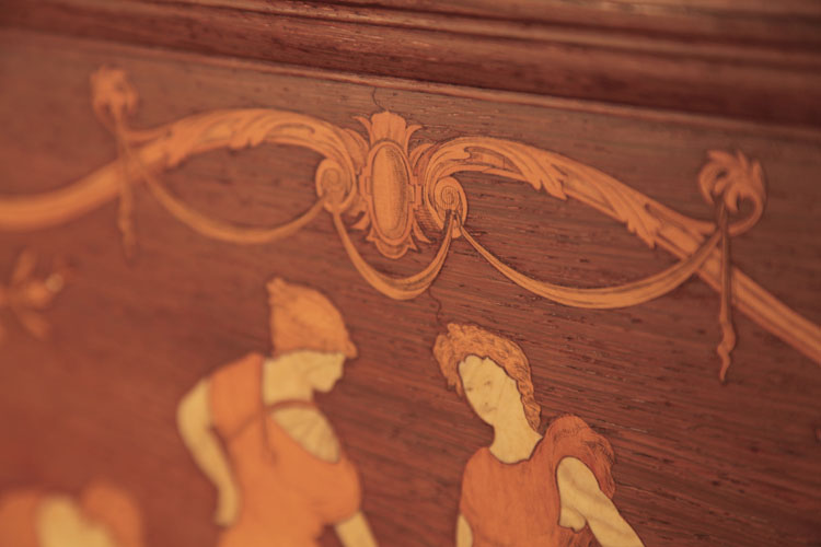 Inlay detail of swags and central cabuchon