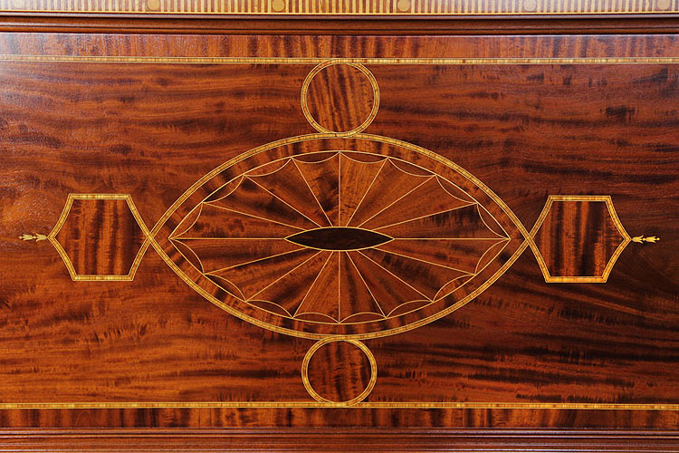  Weber front panel inlay detail featuring geometric forms in a variety of woods 