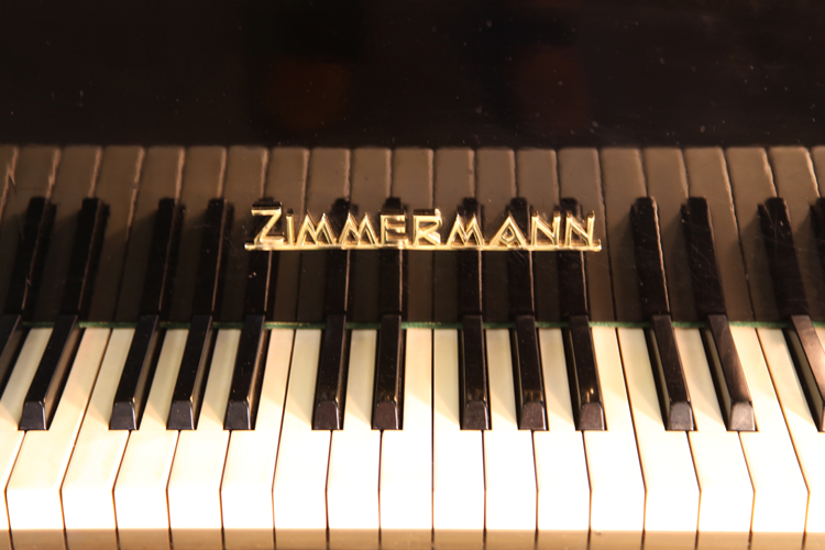 	
Zimmermann piano manufacturers logo on fall