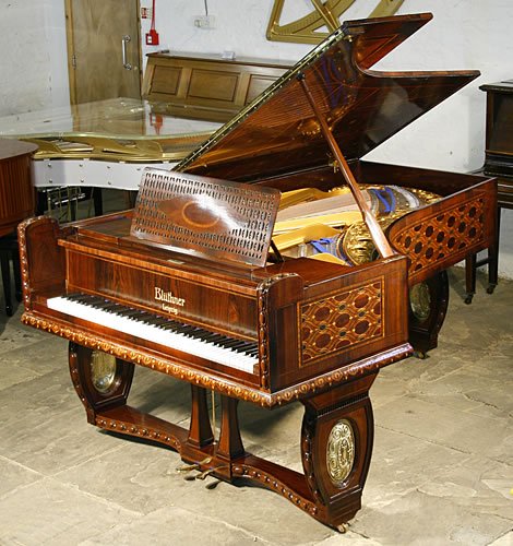 The Golden Age of Pianos. A 1910, Bluthner grand pianofor sale in Jacaranda  with intricate, marquetry inlay all over case in a variety of designs and woods