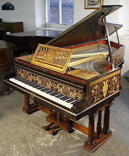 The GOlden Age of Pianos. An 1891, Broadwood grand piano for sale with an intricately inlaid case. Designed by T G Jackson and inlaid by C H Bessant Faber