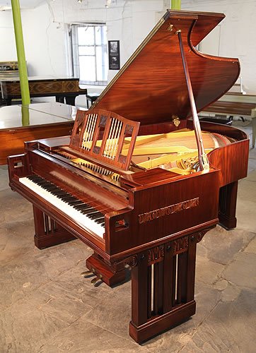 The Golden Age of Pianos. A 1916, German Arts and Crafts, Ibach grand piano for sale with a mahogany case and minimal carved panel detail