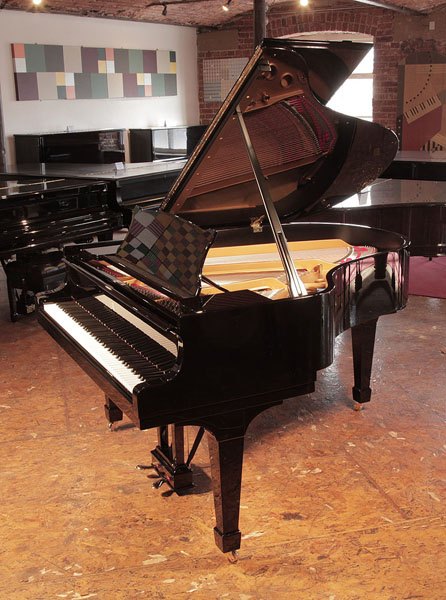 Rebuilt, 1956, Steinway Model M grand piano for sale with a black case and spade legs Rebuilt, 1956, Steinway Model M grand piano for sale with a black case and spade legs